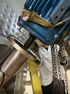 Construction millwright installing machinery